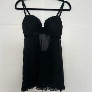 Gillian $ O’Malley Babydoll Mesh Top